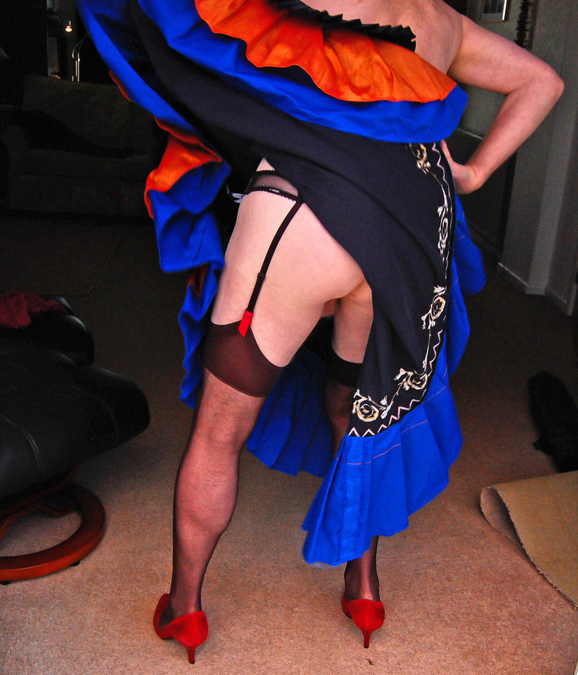 Photograph_of_a_crossdresser_wearing_a_flamenco_dress_from_the_n - adanon